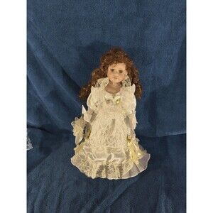 Porcelain Doll with Satin And Lace Dress and Curly Hair "Cathay Collection"